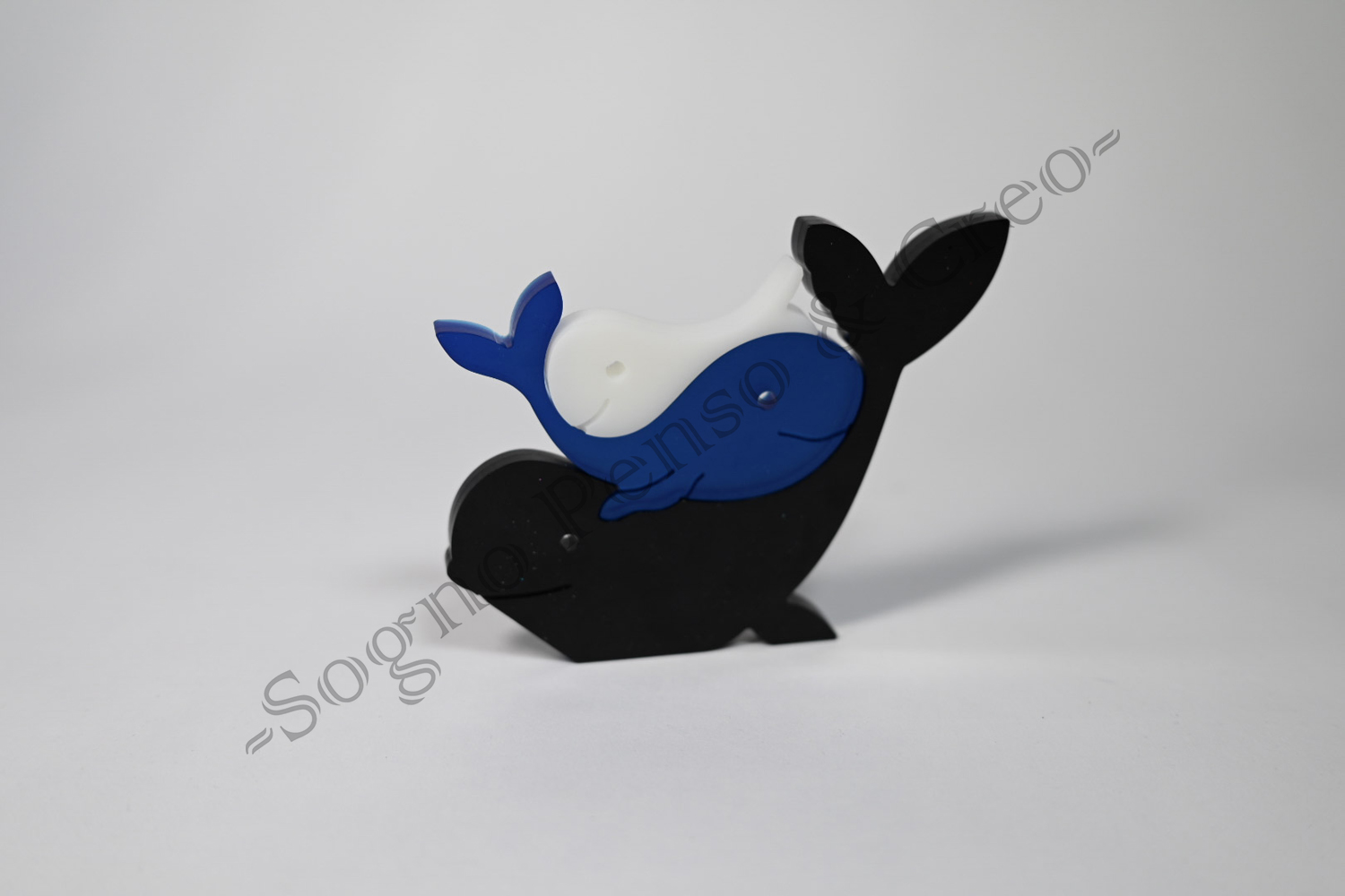 Tris balene nero